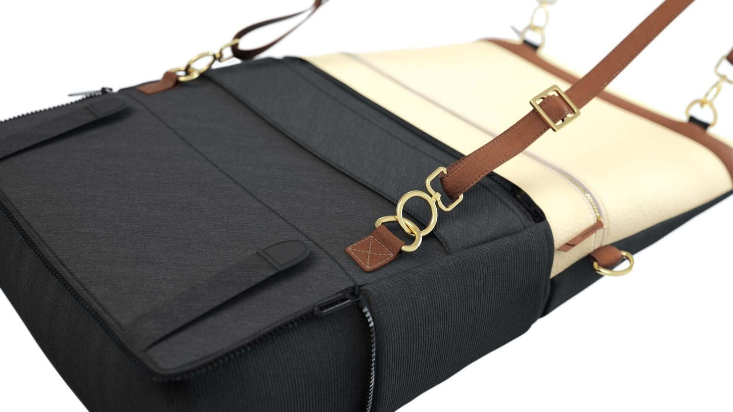 Convertible backpack purse in beige and black color lying down